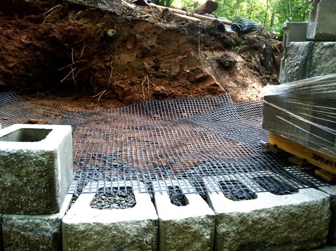 Installation of geogrid in wall construction