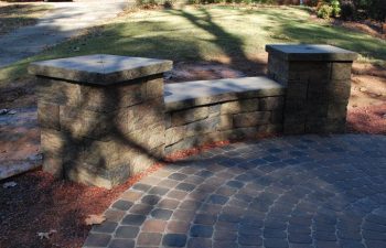 paver “circle kit” and seat wall with columns