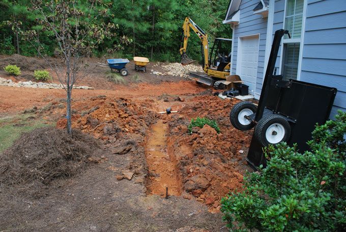 an excavation for dry creek bed