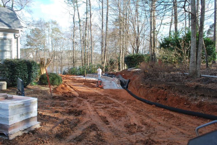 preparing yard for wall installation