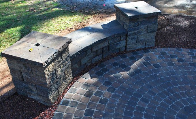 paver circle patio and seat wall with columns