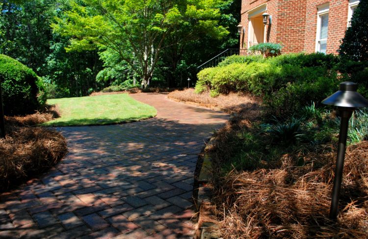 Holland stone old town blend walkway with landscape lights in front yard