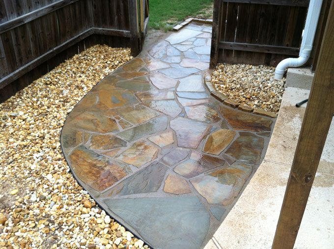 flagstone walkway and gravel finished out an ugly corner and gave good access to pool pump just outside gate