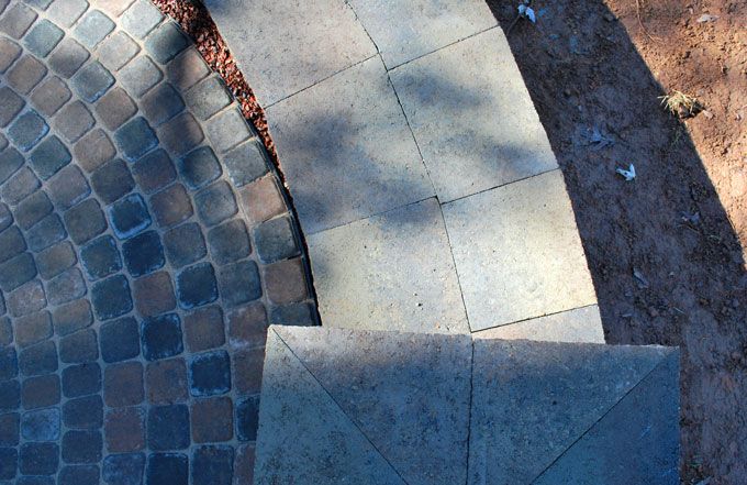 circle kit pavers with knee walls and benches