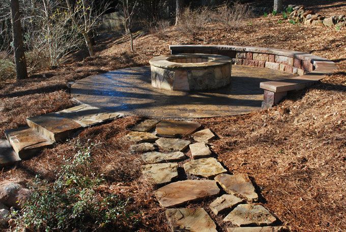 natural setting & fire brick fire pit tucked into hillside