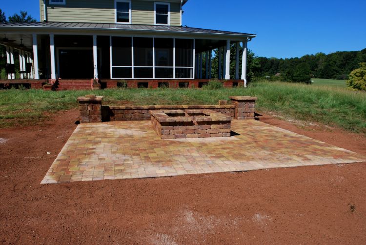 tremron patio with wall and fire pit