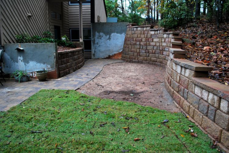 sod installation next to a new patio wall