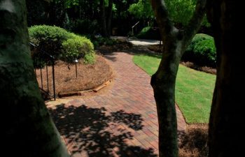 paver sidewalk to the garden