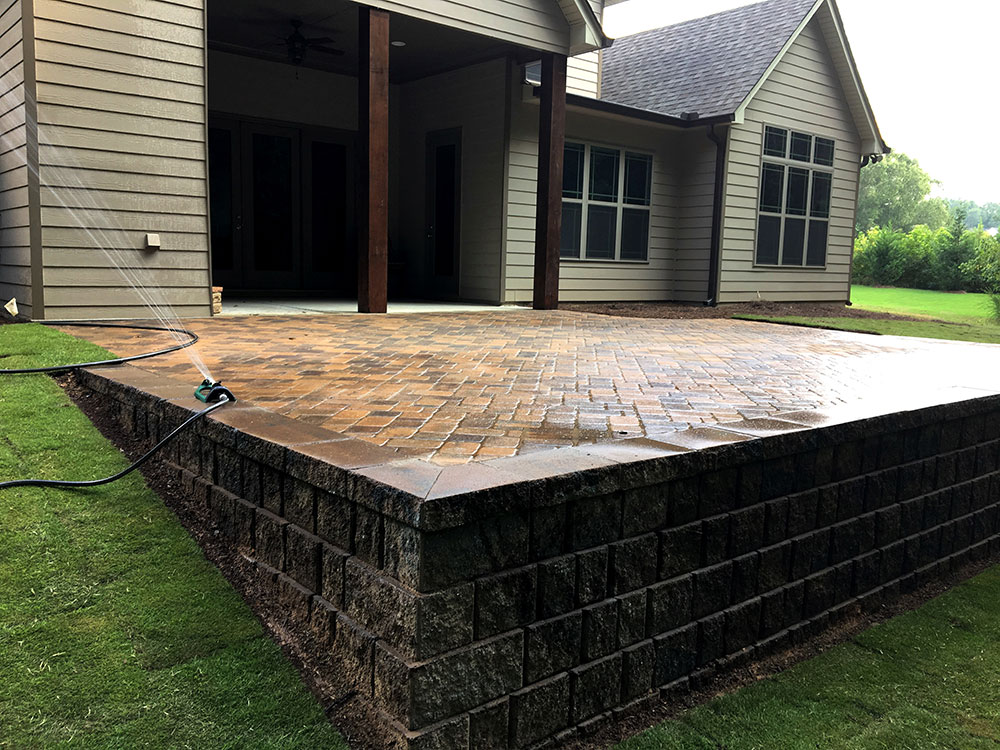 paver patio with stone boarders